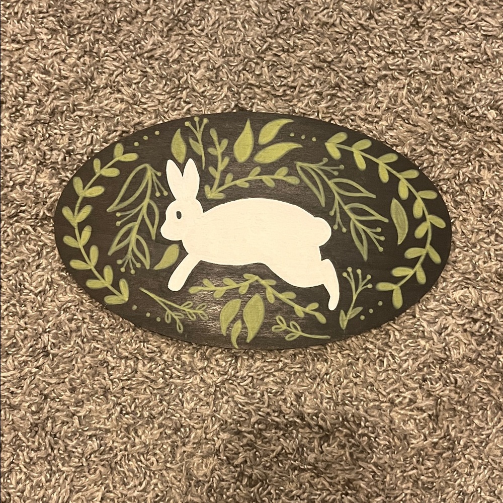 Decorative Oval Plaque with White Rabbit and Green Leaves